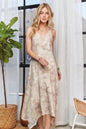 Taupe ADORA printed spaghetti strap midi dress by Trendsi, featuring a flowy silhouette and stylish pattern.