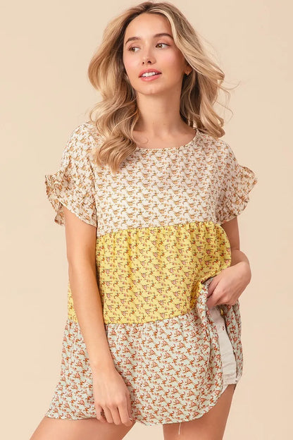 Trendsi BiBi floral printed woven color block and tiered top in yellow and sage, featuring a stylish, layered design.