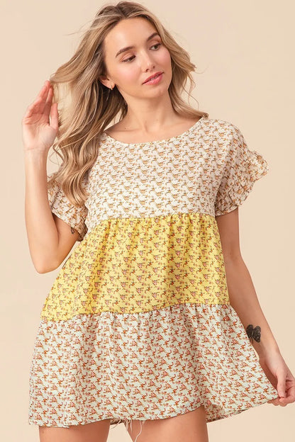 Trendsi BiBi floral printed woven color block and tiered top in yellow and sage, featuring a stylish, layered design.