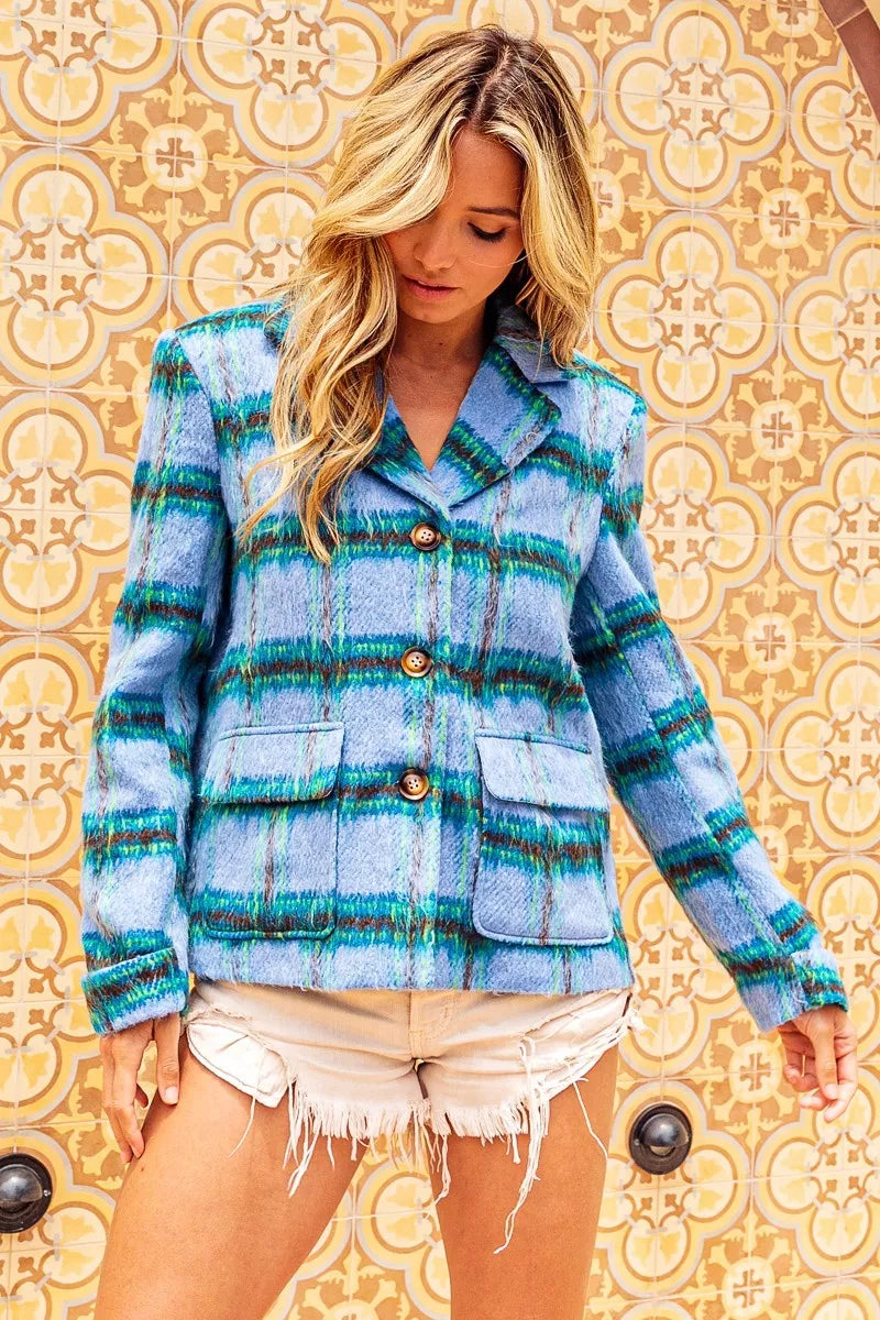 Trendi BiBi brushed vintage plaid jacket with flap pockets, featuring a stylish multi-color blue design and classic button closure.