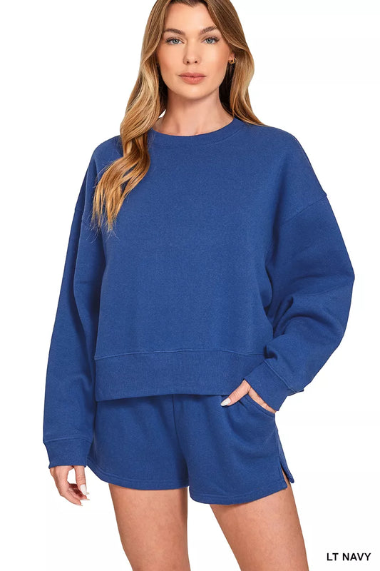 Navy Zenana fleece sweatshirt and shorts set with round neck, casual loungewear from Trendsi, shown on a model.