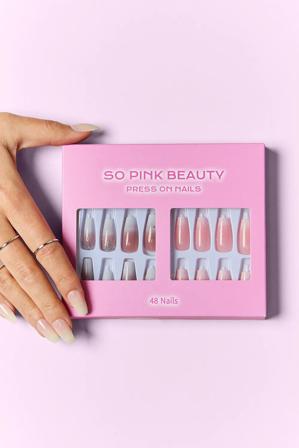 Marbled pink press on nails from Trendsi SO PINK BEAUTY, two packs of stylish, easy-to-wear false nail sets.