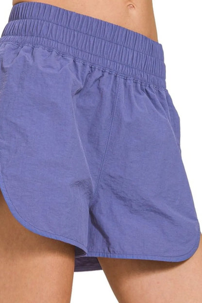 Zenana windbreaker running shorts with smocked waistband, lightweight and comfortable for active wear.