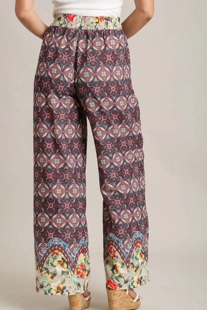 Plus size Umgee mixed print elastic waistband pants in maroon, featuring a relaxed fit and comfortable design.
