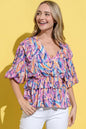 Mauve multi-colored lantern sleeve blouse from Trendsi with printed design and relaxed fit, stylish for casual or office wear.