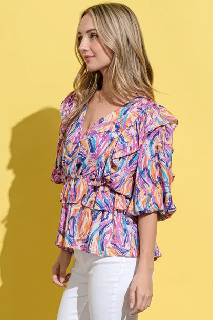 Mauve multi-print lantern sleeve blouse by Trendsi with relaxed fit and stylish design.