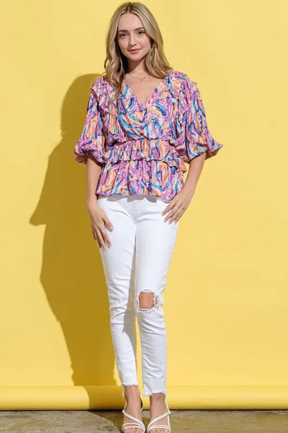 Mauve multi-colored printed lantern sleeve blouse from Trendsi, featuring a flowy fit and stylish design.