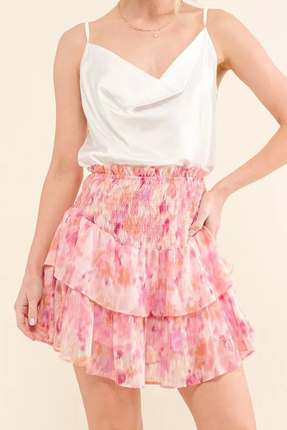 Mauve-red tiered skort with printed lurex design and smocked waist from Trendsi, showcasing a flowy, layered look.