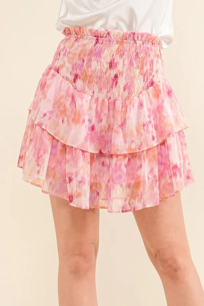 Mauve red printed lurex smocked waist tiered skort from Trendsi, featuring a flowy, tiered design and subtle shimmer fabric.