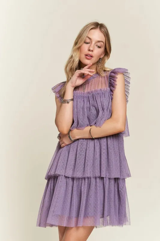 Mauve layered ruffled cap sleeve mesh dress by Trendsi, featuring a flowy silhouette and delicate ruffle details