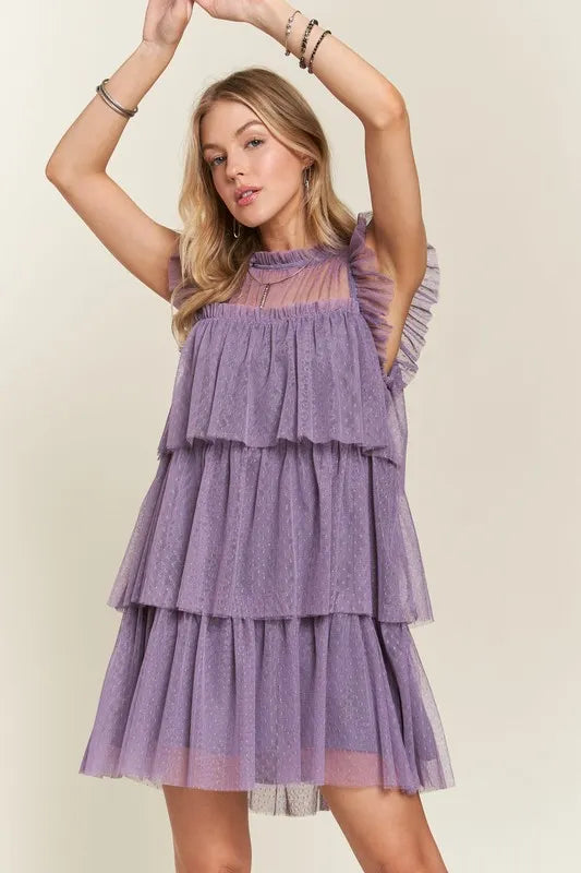 Mauve layered ruffled cap sleeve mesh dress by Trendsi featuring a flowy, elegant design with ruffles and sheer mesh fabric.