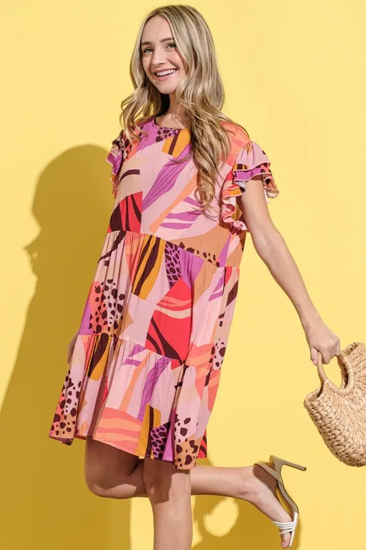 Mauve printed double ruffle sleeve dress from Trendsi, stylish and flowy with elegant ruffle details.