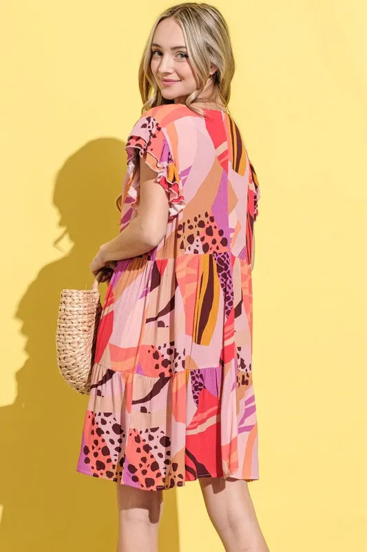 Mauve printed double ruffle sleeve dress by Trendsi, featuring a stylish design with layered ruffles and a feminine silhouette.
