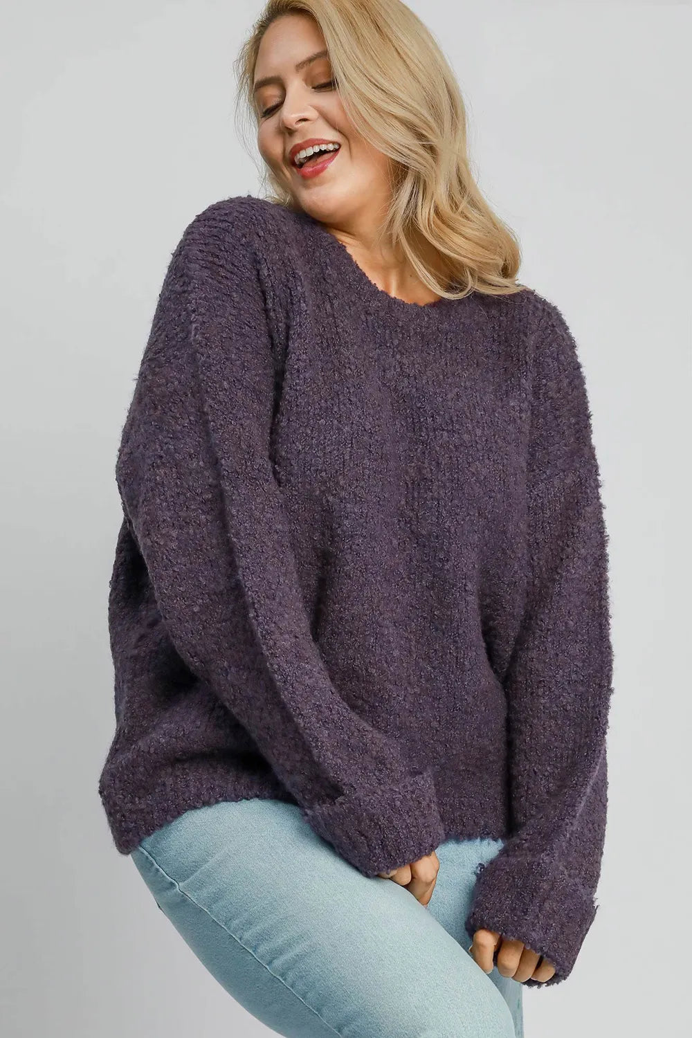 Plus size mauve Umgee boucle sweater with round neck and long sleeves, featuring a cozy textured knit design.