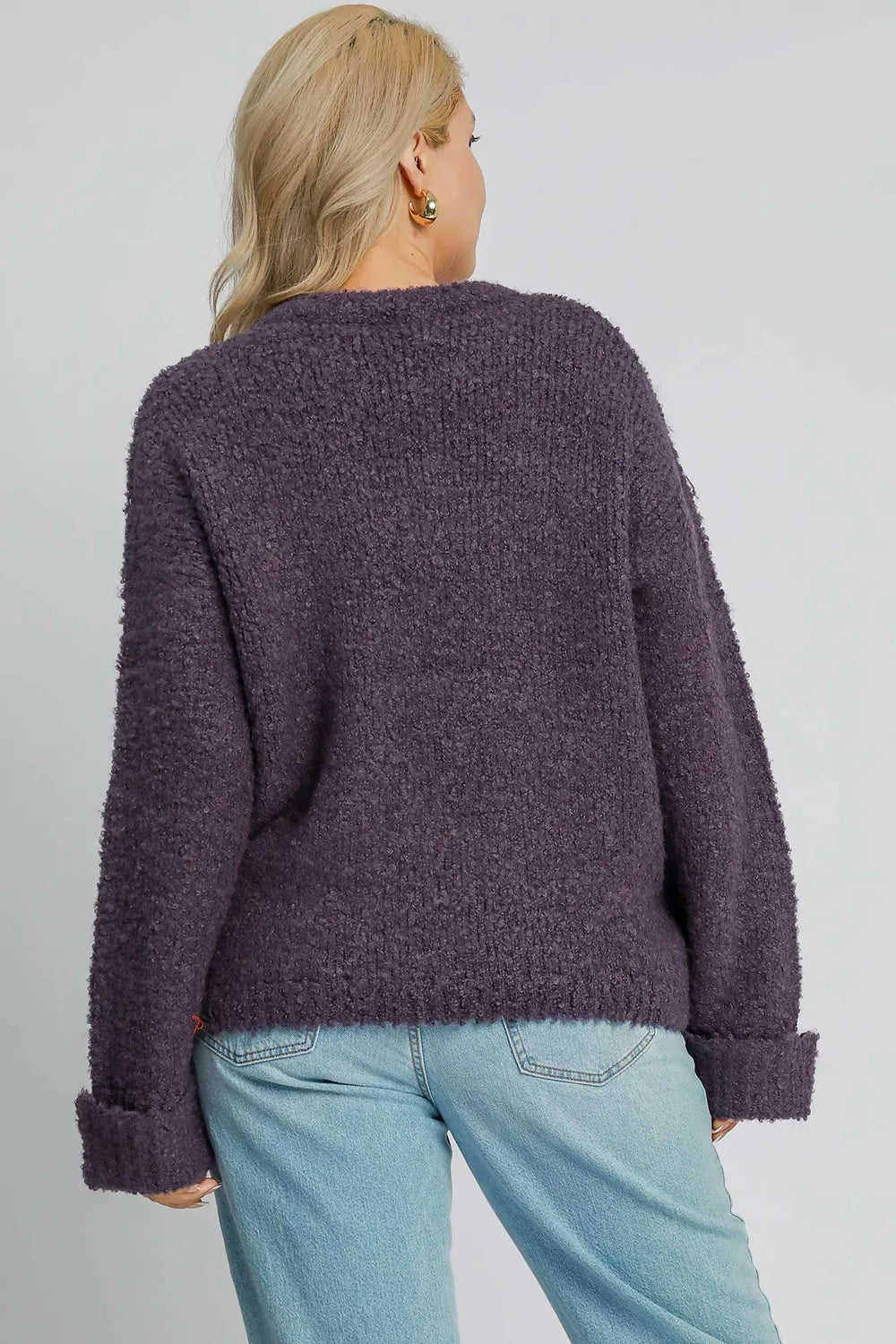Plus size mauve Umgee boucle sweater with round neck and long sleeves, featuring a textured, cozy knit design.