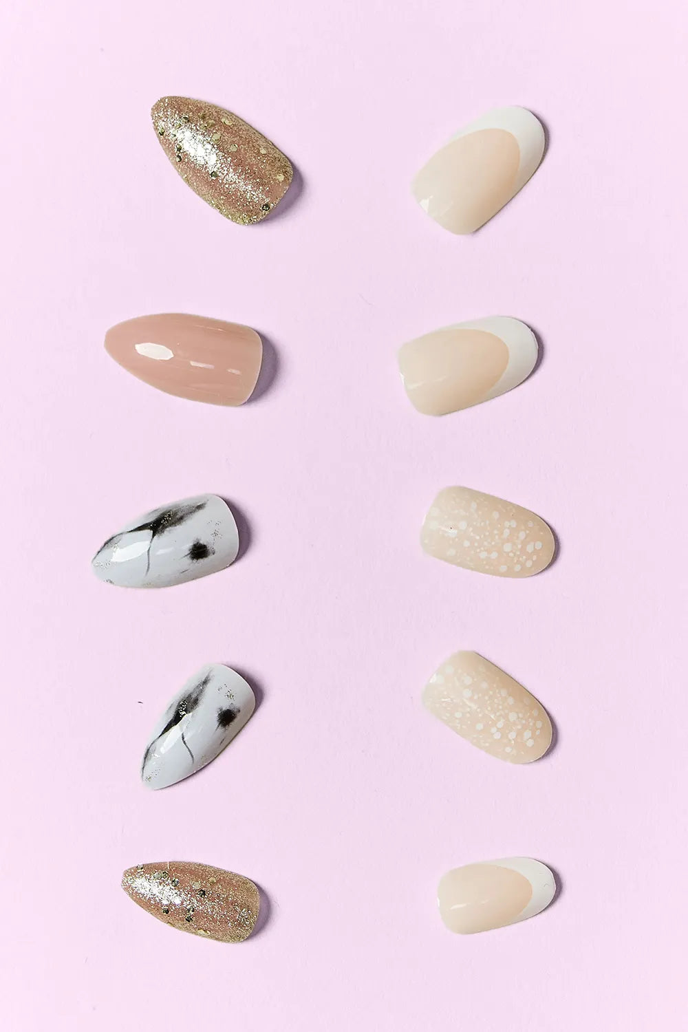Trendsi SO PINK BEAUTY press-on nails in two packs, showcasing a stylish pink nail design on natural-looking nails.