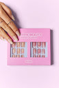 Trendsi SO Pink Beauty press on nails, two packs of stylish, one-size artificial nail sets with pink design for easy application.