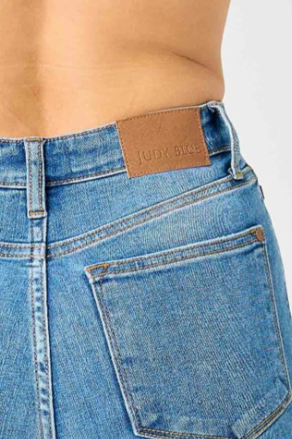 Plus size Judy Blue high-waisted classic flare jeans with full-length fit, featuring a stylish vintage-inspired denim look.