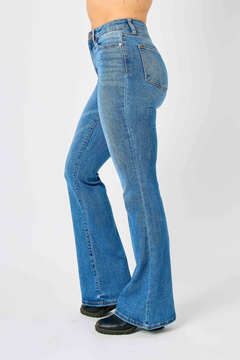 Plus size Judy Blue high-waisted classic flare jeans with a full-length fit, featuring a stylish and comfortable denim design.