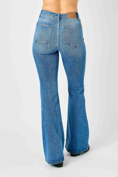 Plus size Judy Blue high-waisted classic flare jeans with a full-length fit, featuring a stylish and comfortable denim design.