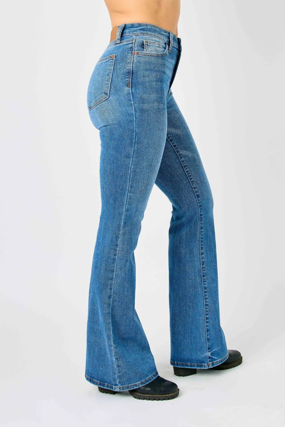 Plus size Judy Blue high-waisted classic flare jeans, full length, with a fitted waistband and stylish flare leg silhouette.