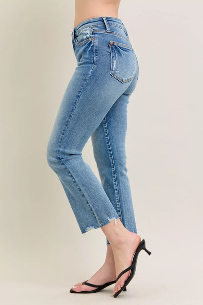 Judy Blue Mr Vintage Wash Destroy Hem Kick Flare Jeans with distressed details and flared legs, styled for a casual look.