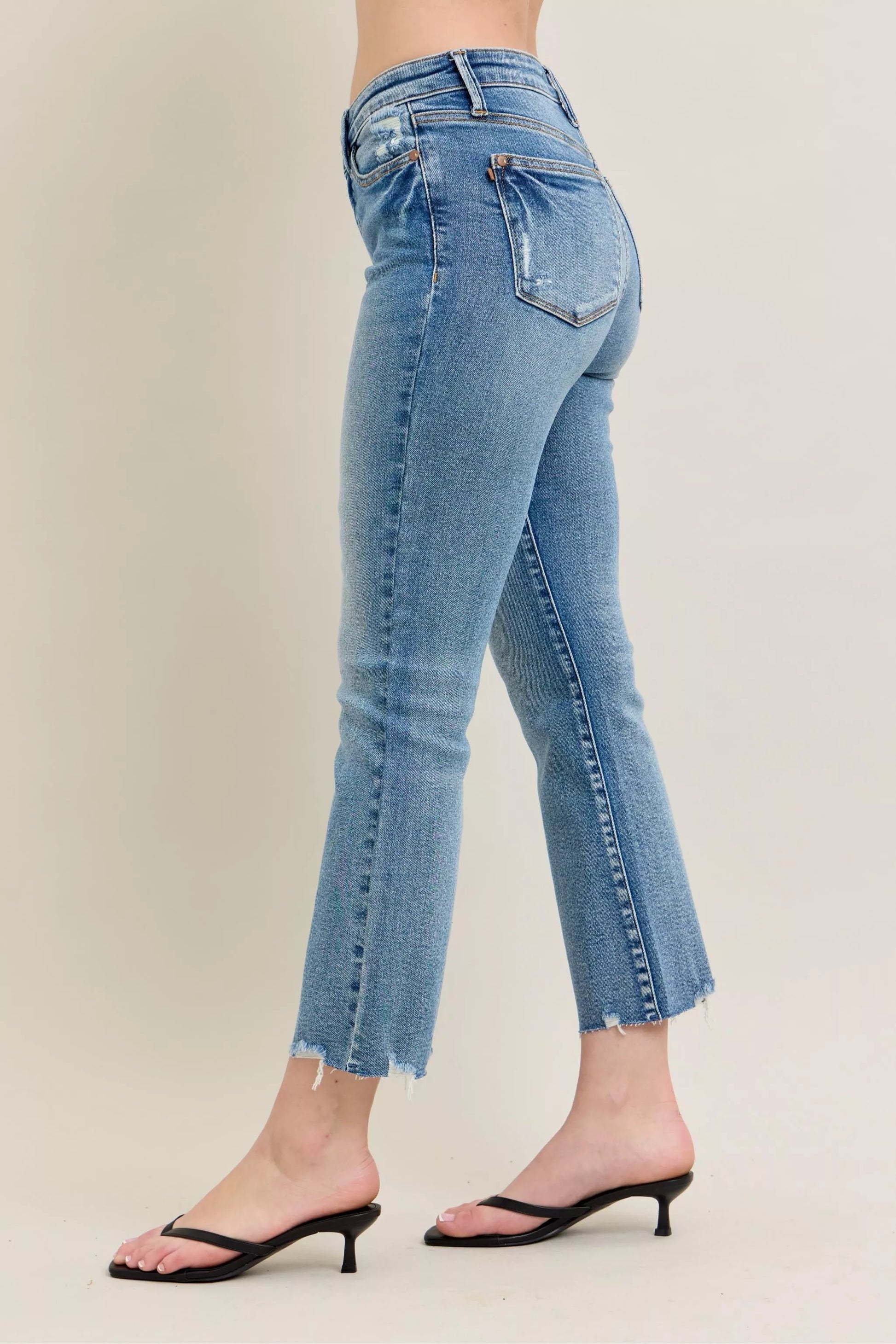 Judy Blue Mr Vintage Wash Destroy Hem Kick Flare Jeans with distressed details and flared leg, displayed on a neutral background.