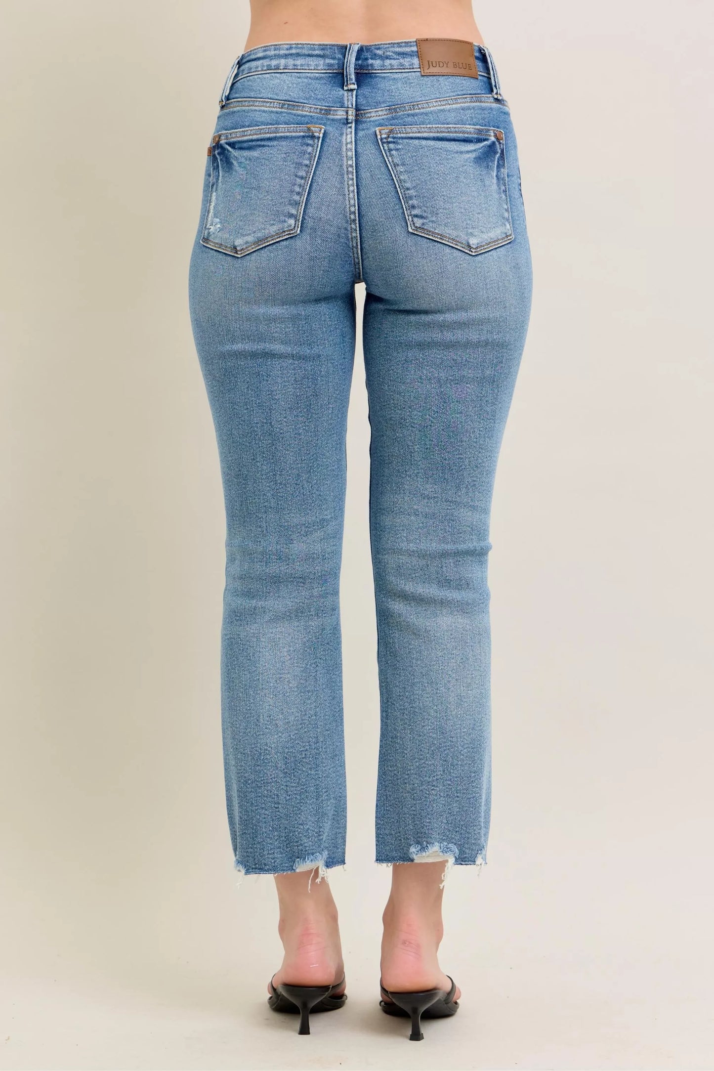 Judy Blue Mr Vintage Wash Destroy Hem Kick Flare Jeans with distressed details and wide leg opening, trendy denim for women.