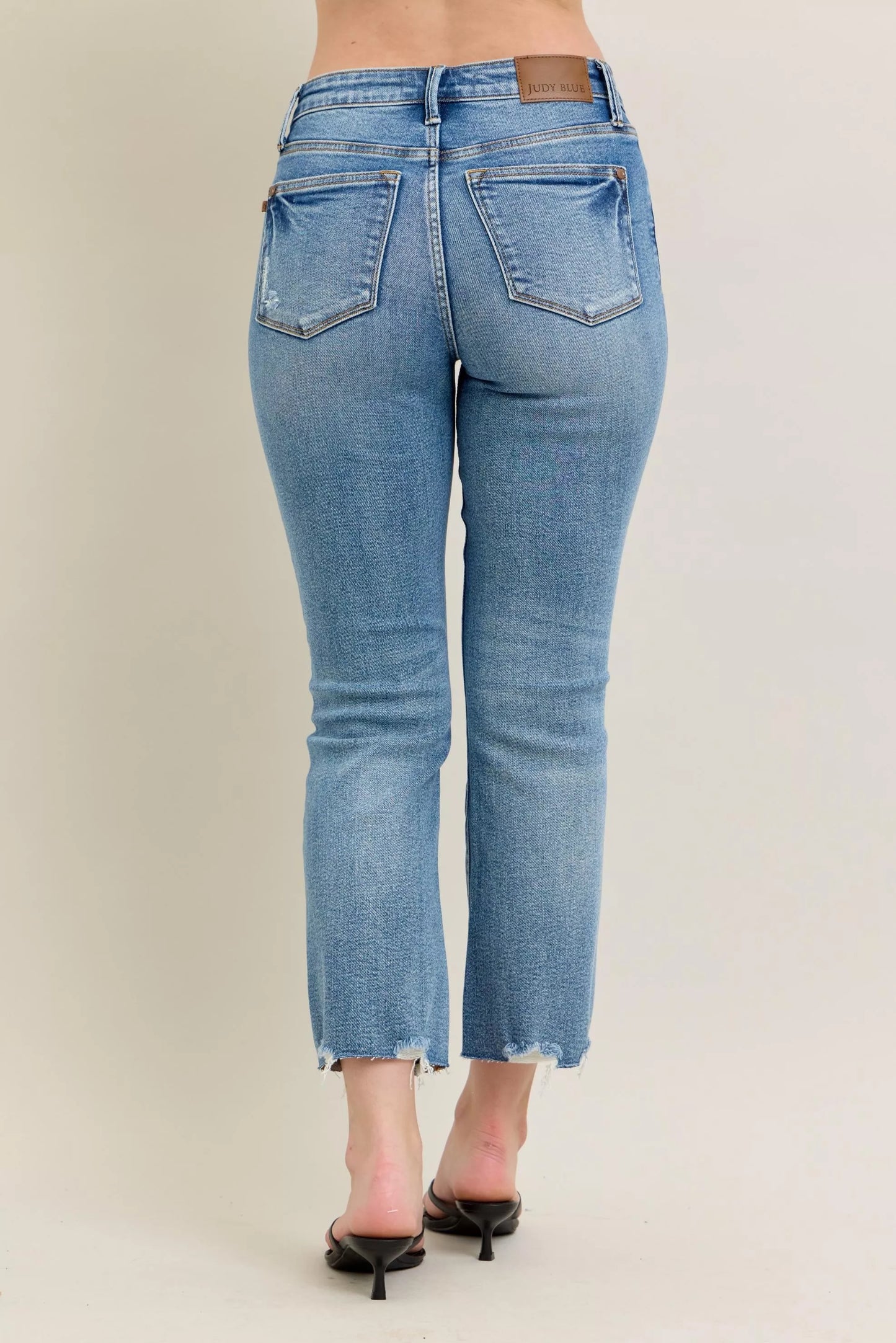 Judy Blue Mr Vintage Wash Destroy Hem Kick Flare Jeans with distressed details and flared legs, casual denim style.