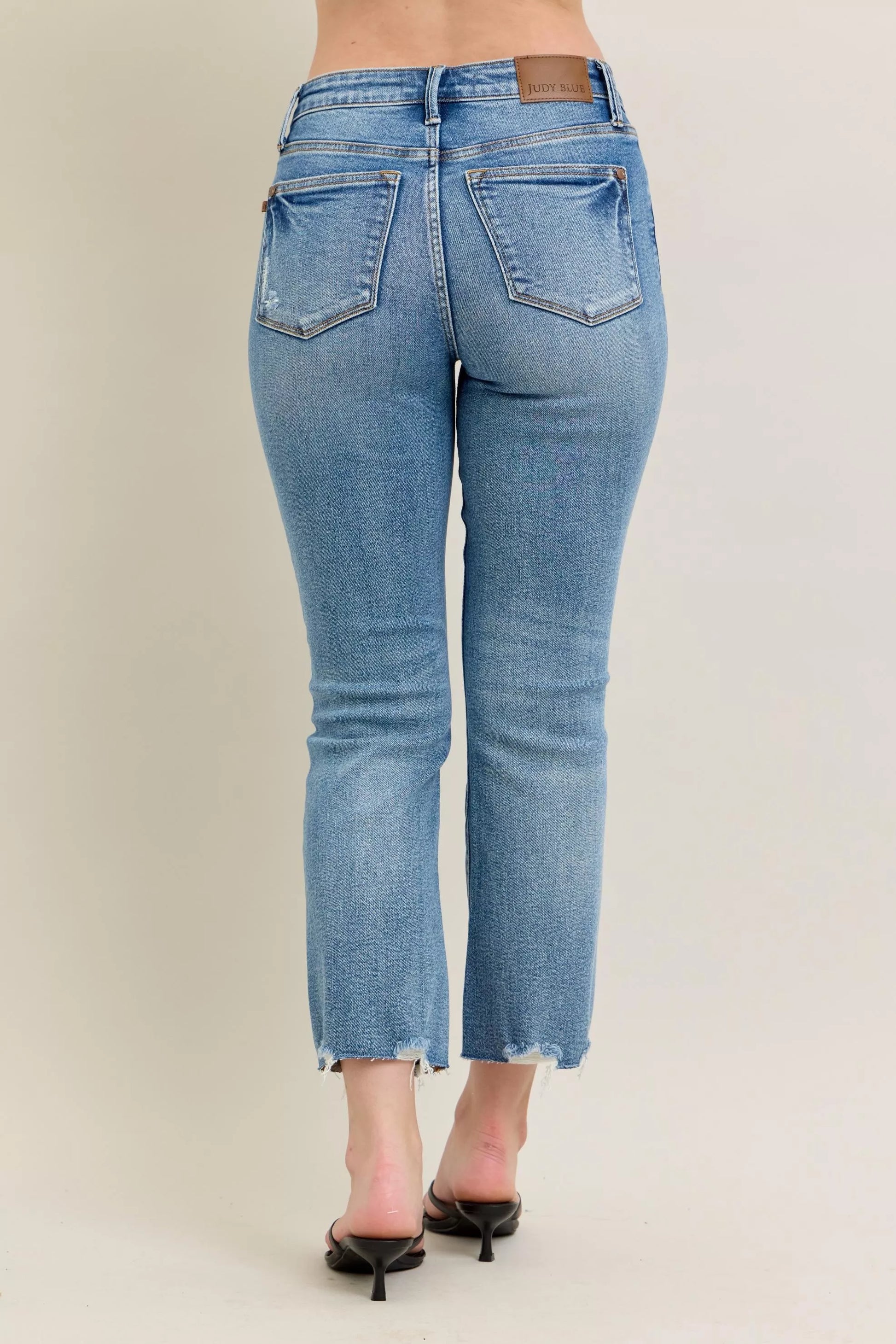 Judy Blue Mr Vintage Wash Destroy Hem Kick Flare Jeans with distressed details and flared legs, casual denim style.