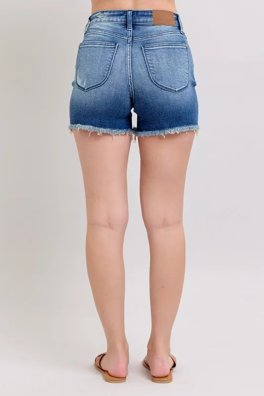 Plus size Judy Blue denim shorts with V-front design and shield pockets, featuring a stylish fit and full size options.