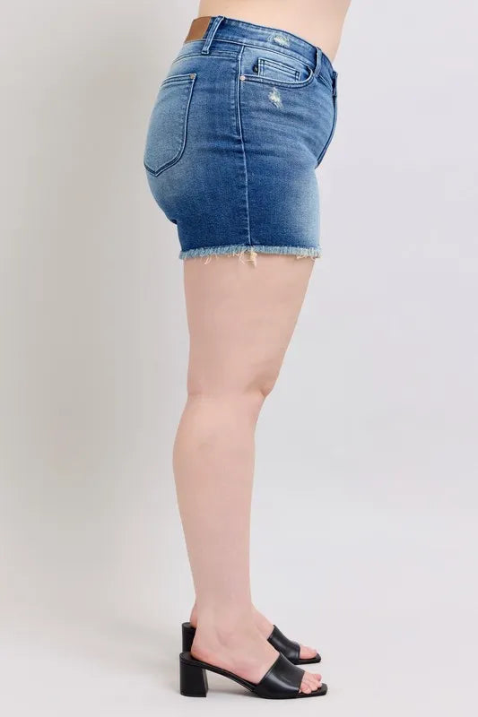 Plus size Judy Blue V-front denim shorts with shield pockets, stylish full-size shorts in classic blue denim.