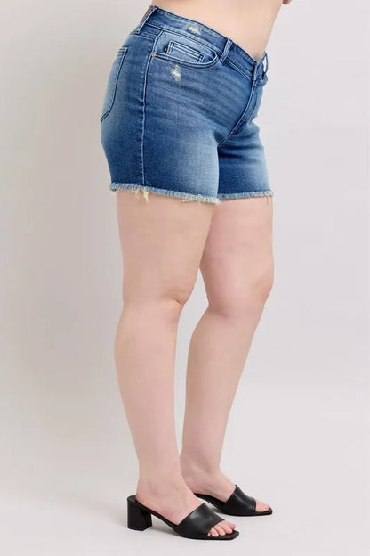 Plus size Judy Blue V-front denim shorts with shield pockets, featuring a stylish design and full-size fit.