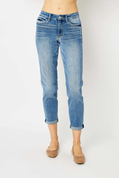 Full view of Judy Blue full-size cuffed hem slim jeans, showing dark wash denim and stylish rolled cuffs.