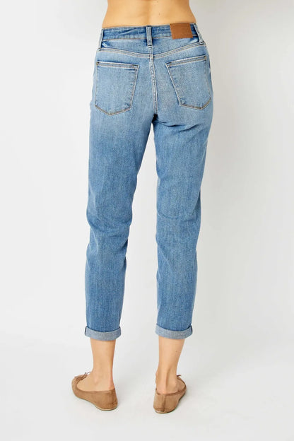 Full size Judy Blue slim jeans with cuffed hem, showcasing dark denim and classic fit, designed for a stylish casual look.