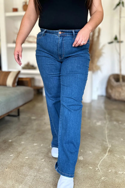Medium shot of Judy Blue full-size high-rise straight jeans displayed on a model, showcasing classic denim fit and style.