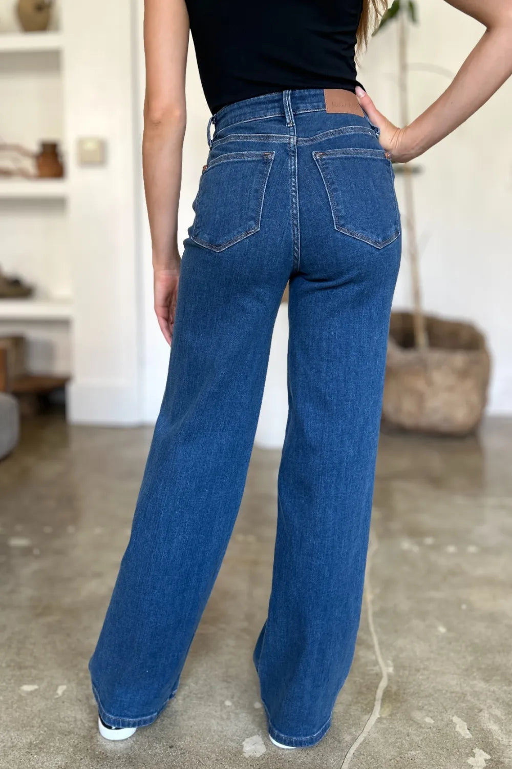 Medium image of Judy Blue high-rise straight jeans in full size, showcasing classic denim fit and clean stitching details.