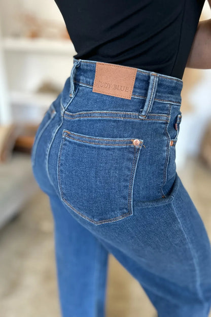 Medium image of Judy Blue high-rise straight jeans, full size, showcasing classic denim fit and clean waistband detail.