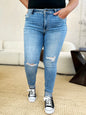Judy Blue full-size mid-rise destroy and cuff skinny jeans, trendy denim with distressed details and rolled cuffs.