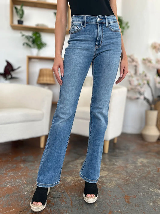 Medium wash Judy Blue full-size mid-rise waist straight jeans, shown on a model, with classic five-pocket design.