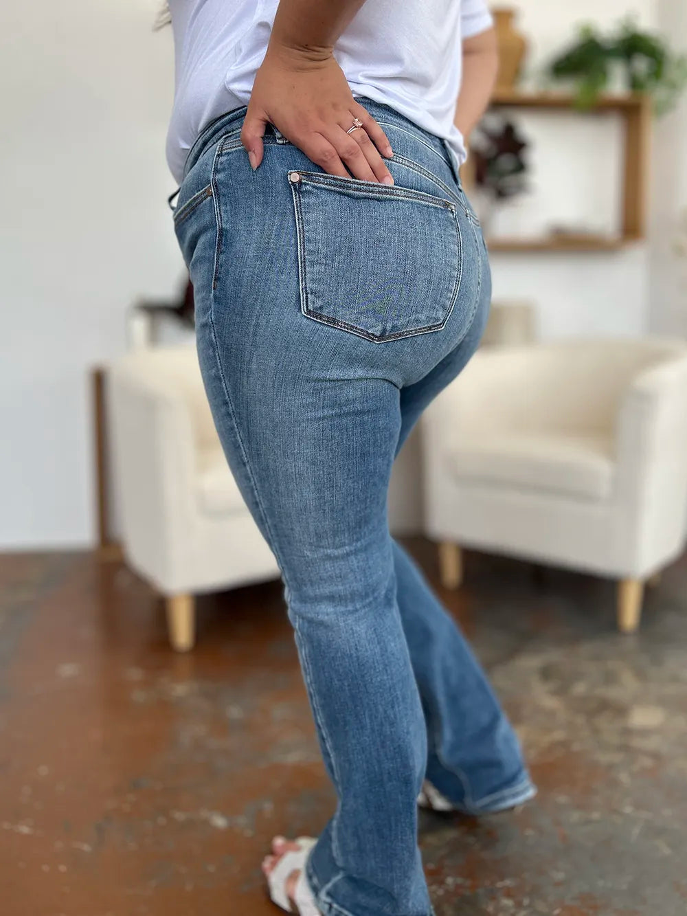 Medium wash Judy Blue full-size mid-rise waist straight jeans with classic fit and clean design, displayed on a white background.