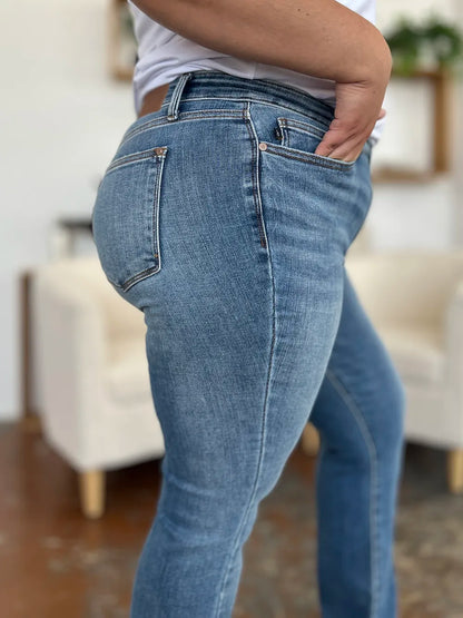 Full view of Judy Blue full-size mid-rise waist straight jeans, denim fabric, classic five-pocket design, on a plain background.