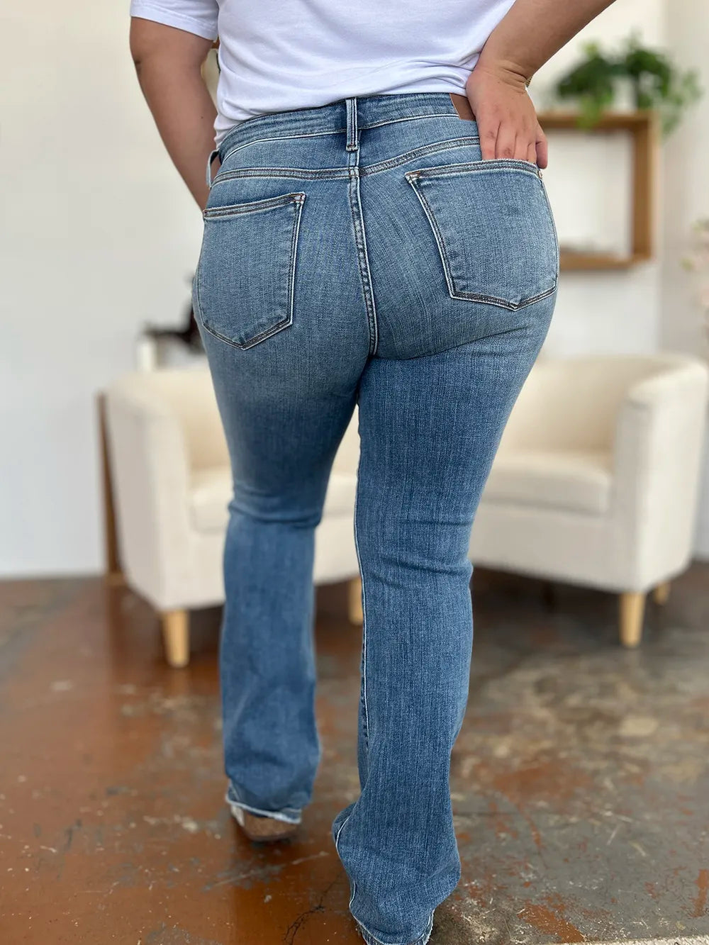 Medium wash Judy Blue full size mid-rise waist straight jeans with classic fit and five-pocket design.