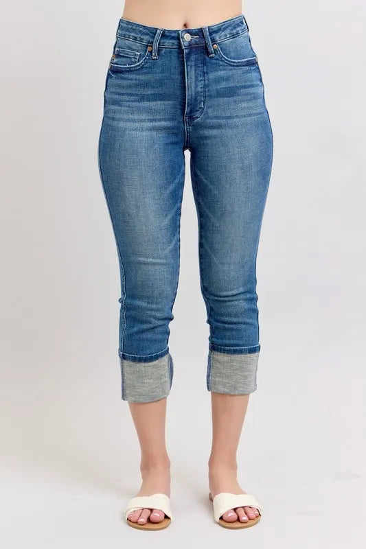 Plus size Judy Blue skinny cuff capris jeans with pockets, full length, in a medium wash, designed for a comfortable fit.