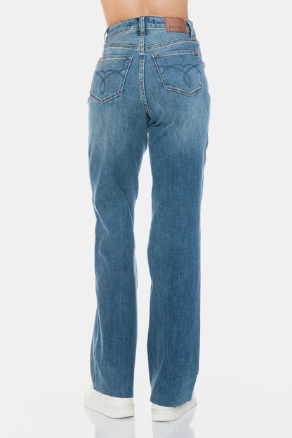 Judy Blue full size tummy control straight jeans with raw hem, featuring a classic fit and distressed detailing.