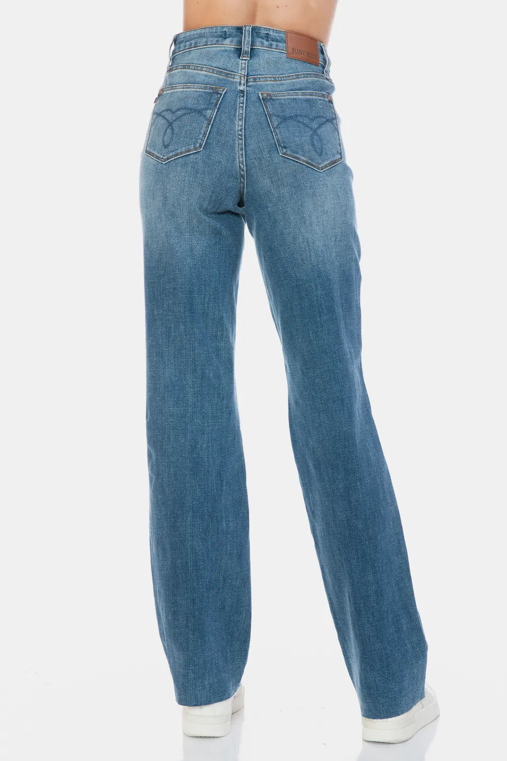 Judy Blue full-size tummy control straight jeans with raw hem and cut details, casual denim pants for women.