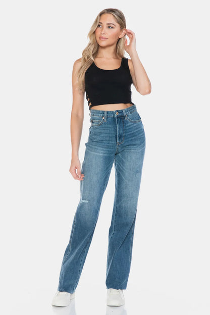 Judy Blue full size straight jeans with tummy control and raw hem detail, featuring a classic cut and stylish raw edge design.