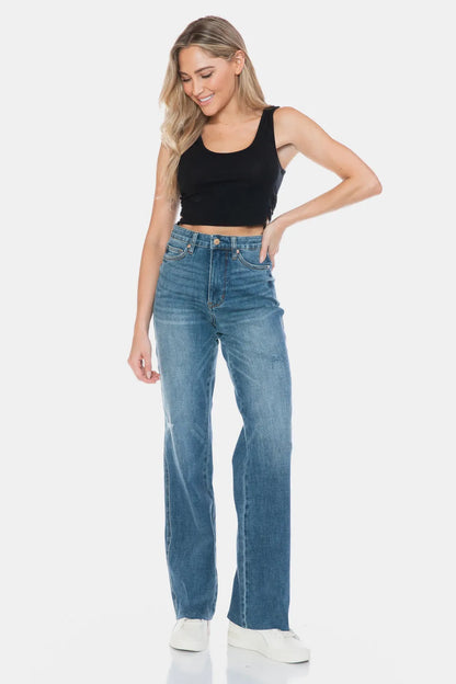 Judy Blue full size straight jeans with raw hem and tummy control, featuring a cut raw hem design and classic denim look.
