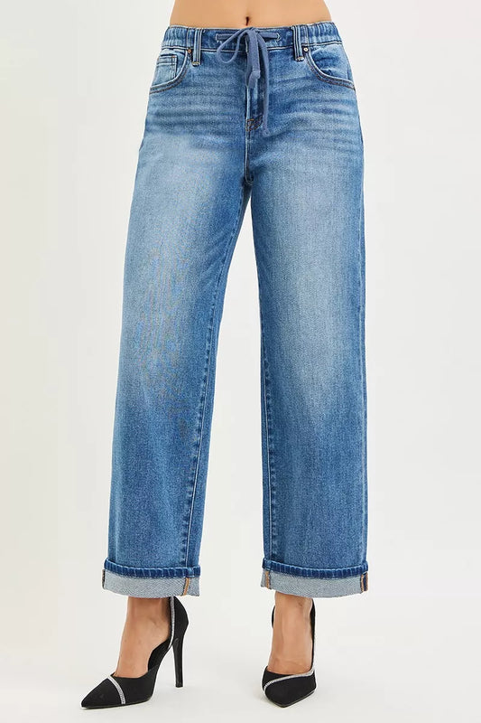 Risen elastic band slouch ankle boyfriend jeans with cuffed hem, casual denim style, featuring a relaxed fit and trendy design.