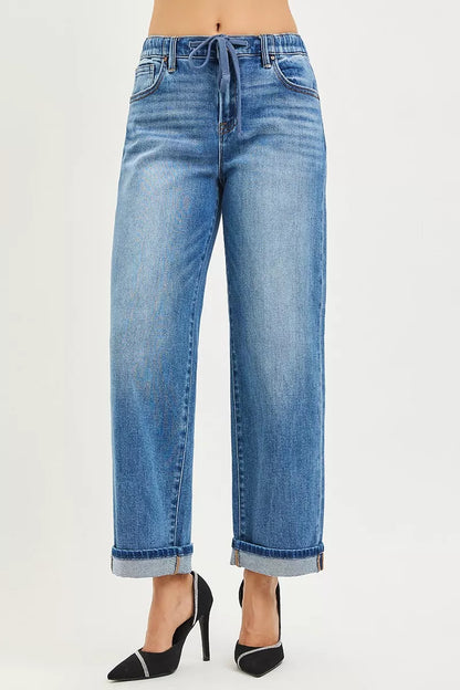 Risen elastic band slouch ankle boyfriend jeans with cuffed hem, relaxed fit, and trendy style, worn by a model.